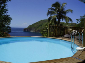 Villa Palma avec vue mer et piscine privée location Domaine de la Pointe Batterie à Deshaies
